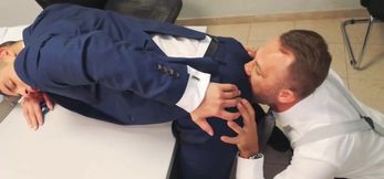 Suited Bastian Karim bent over for an booty ramming