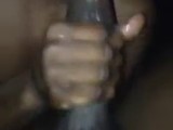 Black slut is giving a blowjob to her boyfriend, who is trying to record her in action