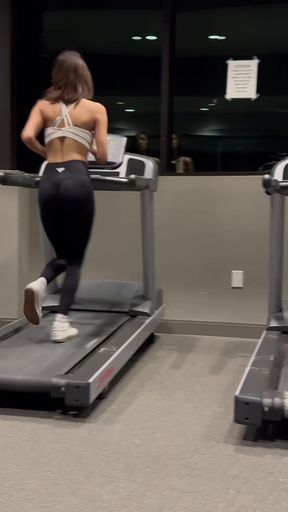 Woman jogging on treadmill
