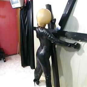 BDSM hardcore latex suit with funnel head