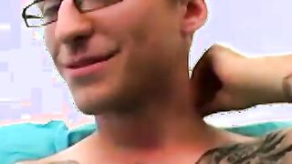 Geeky amateur with glasses and tattoos strokes his big cock