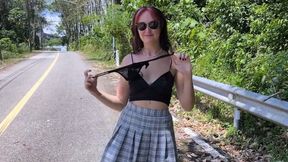 Riding on the motorbike and flashing her sexy body to the camera