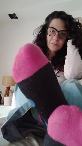 Sexy babe in knee-high socks shows off her ankles