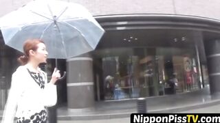 NipponPissTV.com - Nerdy Asian cocktease kneels for pissing behind tree outdoors