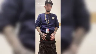 Skinny American model jerks his big cock in public bathroom at work