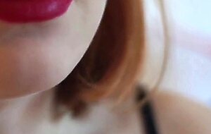 Redhead babe smokes and gives a blowjob to a big cock