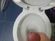 Spraying the bathroom floor.