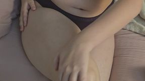 Rubbing lotion onto my legs and feet (and my tummy and arms)