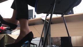 secretary in black high heels and tan nylon socks