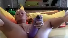 Wild blonde Chick stretching her cunt with a large dildo