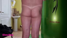 tanned ass after a solarium. crossdresser in a chastity belt in a thong from a tanning bed.