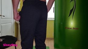 tanned ass after a solarium. crossdresser in a chastity belt in a thong from a tanning bed.