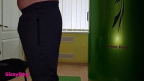 tanned ass after a solarium. crossdresser in a chastity belt in a thong from a tanning bed.