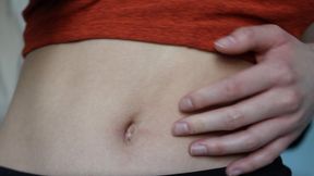 Aurora Plays With Her Belly Button