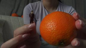 Giantess stepsister put tiny stepbrother in an orange then juggled with it like a ball and put the orange on tiny stepbrother's face then giantess stepsister eats the orange but forgets that tiny stepbrother is in the orange so he eats him too