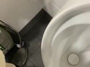 Having a risky wank in public toilets