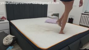 Nastya, in a shirt and panties, jumps and tramples the mattress and the large bed, first in heels, then in very dirty sneakers, and then barefoot, the poor mattress. 2 angle