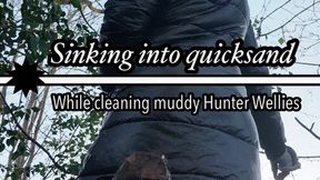 Sinking into quicksand while cleaning muddy Hunter wellie boots!