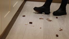 Crushing Reeses chocolates under my black boots