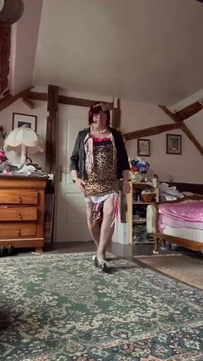 Dressed in a little short leopard dress for an evening
