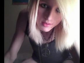 Platinum blonde emo tgirl does a bit of softcore posing