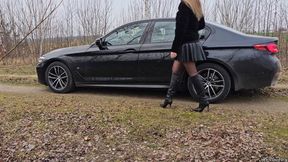 Driving BMW 5 series in Guess Leather Boots