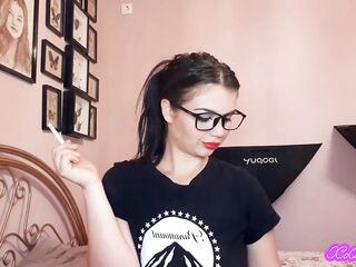 Fleshly brunette hair smokin' and wearing geek glasses