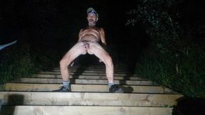 Guy posing naked outside