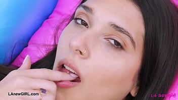 Tall and pretty brunette model shows her sexy body