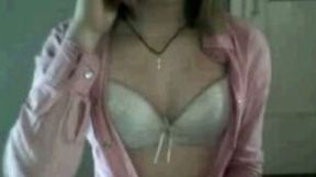 Slender teen shows me her yummy tits and ass on webcam