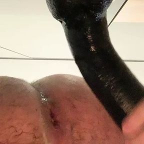 This huge black dildo in my ass was so good.