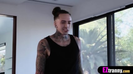 Gorgeous big boobed tranny analyzed by an inked guy