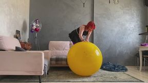 Sabina takes full control of yellow fitness ball in purple leggings