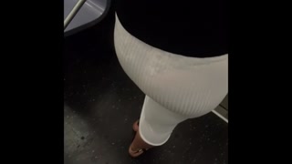 See through candid white dress on train (big booty Latina)