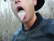 Twink uses cum filled condom after fuck like bubble gum and puts on a condom on his tongue