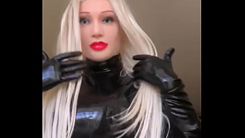 Latex Doll Squeezing Her Silicone Boobs