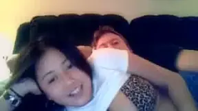 Webcam model couple playing and having fun on the bed