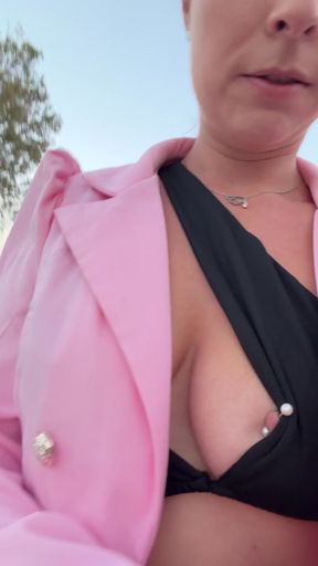 Erect nipples flashing in public with a nipple piercing