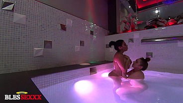 Girls eating in the jacuzzi