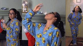 Brat eRica drinks a bottle of cum left by Santa for being a Naughty Girl