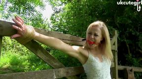 Damsel Tied to Gate Crucifix Bondage & Ballgagged