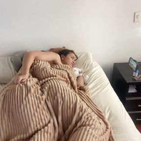 Lesbian sex under the covers on a cold morning