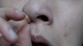 Aurora Digs Into Her Nose
