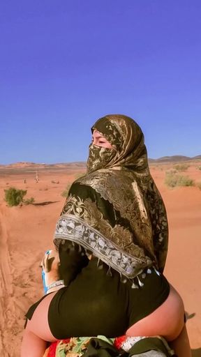 Middle Eastern woman in desert