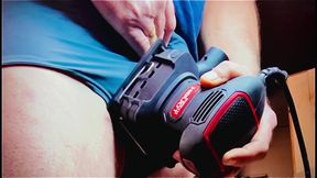 Watch his cock cum all over a wood sander