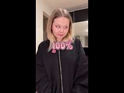 Blonde girl slowly unzips her hoodie with both hands 🍆