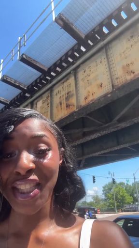 Woman under bridge
