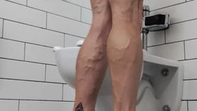 In public restroom Tempest flexes naked butt