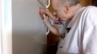 Twink practices deepthroat on fat dildo