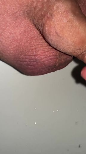 Play with My Small Foreskin Cock While Pissing